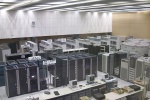 Suns in the foreground, SGI CPUs and disks centre, Linux PCs in the back.  DEC storage, and alphas + tape library to the right